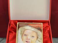 A Baby Girl Enamel Portrait Miniature in presentation box