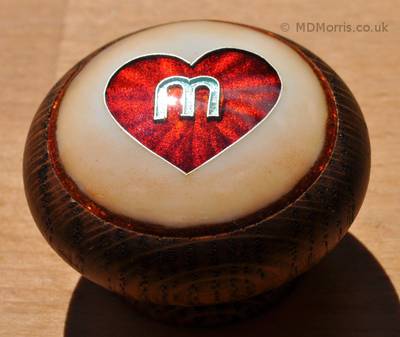 Heart Surrounding the Letter M design by Mark Morris