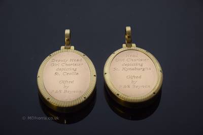 The inscription on the back of the medals