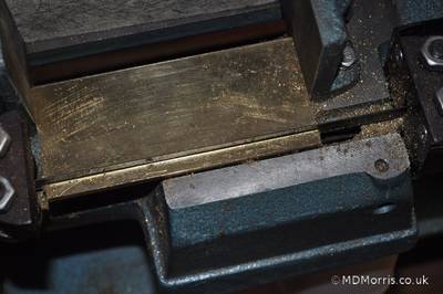 Cut out a bar of brass